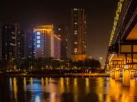 喆啡酒店（信陽息縣一橋龍湖店） 鄰近榮譽新世界購物中心的酒店