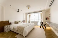 Mutang Design Guesthouse (Leshan Railway Station Shihao Plaza)