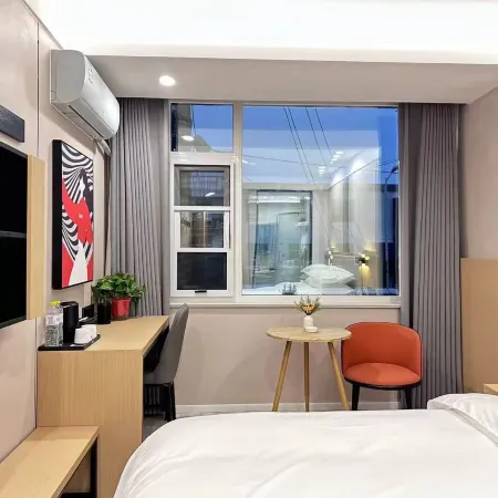 Junyi Hotel (Yucheng Shenglizhen)