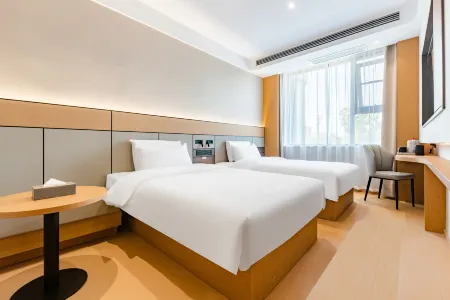 Lanting Hotel (Minquan Railway Station) Отели в г. Миньцюань