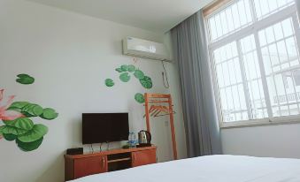 Xiuning Xinyi Hotel