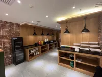 Elong Wanguo Hotel (Dalian Jinma Road Light Rail Station Store) - فطور