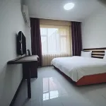 Linjiang Guanglong Business Hotel
