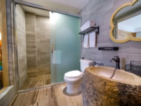 Gongjin Lianri Ecological Cave Hotel (Daocheng Yading Branch) Hoteles en Daocheng