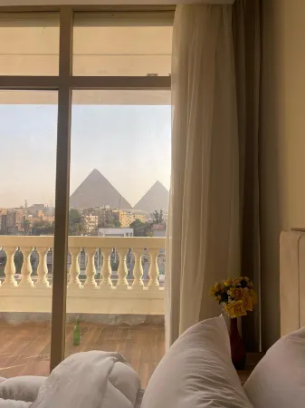 Roone Pyramids View Inn Отели рядом с достопримечательностью «Большой египетский музей»