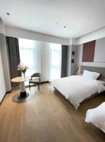 Kaiwo Apartment Hotel (Shanghai Lingang Shuyuan Yuzhou City Plaza) Hotels near Shanghai Binhai Forest Park