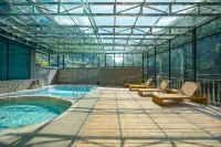 Lixian Bipeng Valley Yulan Huating Hotel - piscina