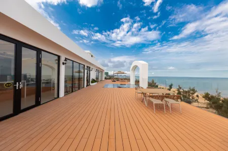 Bihaichaosheng Отели рядом с достопримечательностью «Jinshawan Coastal Park»