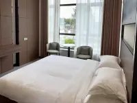 Lakefront Homestay Hotels in Xihe