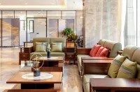 Tekes  Tianwo Hotel (Taiji Tan Branch, Bagua City Center) - Airport Shuttle