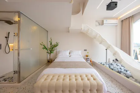 Air and Haimei Suites Отели рядом с достопримечательностью «Dapeng Ancient City»