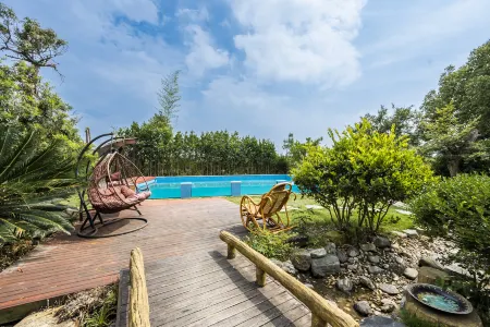 Kunshan Diffuse Time Villa (Yangcheng Lake Store) Отели рядом с достопримечательностью «Bacheng Yinhua Yijing Langman Huahai Theme Amusement Park»