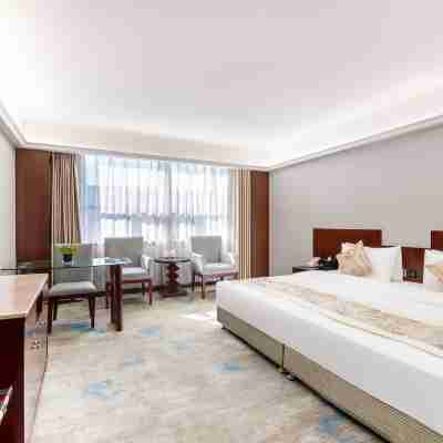 Xingang Holiday Hotel(Xinzheng International Airport Shop) Rooms