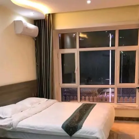 Harbin Dimanjia Fashion Express Hotel Отели рядом с достопримечательностью «Китайская медицинская больница, Хулань, Харбин»