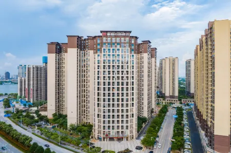 OLYMPIA YUNPIN HOTEL Отели рядом с достопримечательностью «Qinzhou University Xianghuiyuan Campus»