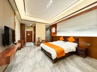 Mengla Yiwu Grand Hotel