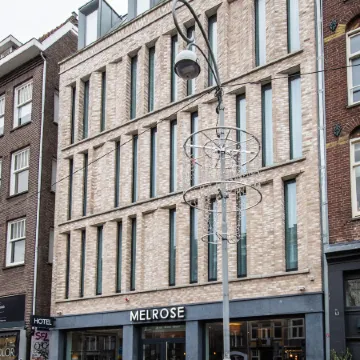 Melrose Hotel Отели рядом с достопримечательностью «Плавучий дом-музей»
