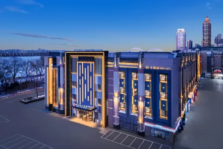 Rezen Dong Hotel (Control Memorial Tower Central Street Branch) Отели рядом с достопримечательностью «Ha'erbin Shangye University»