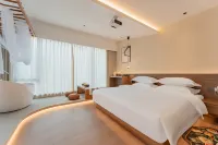 Enshi Tonghui Xiyuan Homestay - Bares