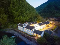 Guyu Mingyuan Hotels near Qinglong Shuanghe Drifting