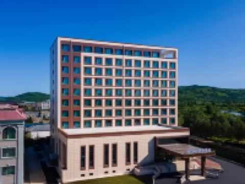 Mohe Yilong Hotel (Municipal Government Branch) Hotéis em Mohe