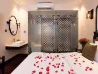 Secret Garden Hotel Hotels near District 12