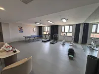 Licheng Huasheng Hotel (Bachu Centery Avenue) - Gym