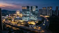 Fangli International Apartment (Shunde Overseas Chinese City Happy Coast Branch) - Condos