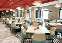 Fuji International Hotel (Huannan County Huaxi Lake Park Store）) - فطور