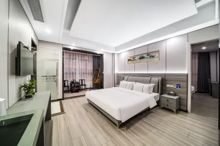 Yuanheng Hotel (Cixi Zhangqi Colorful Plaza) Отели рядом с достопримечательностью «Baiyang Lake»