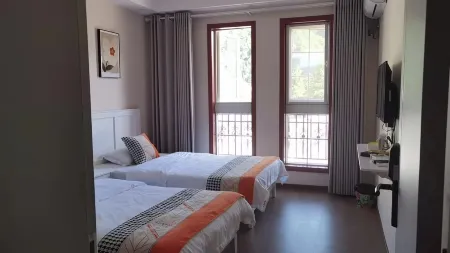 Yaxinyuan Farmhouse Отели рядом с достопримечательностью «Bailu Monastery»