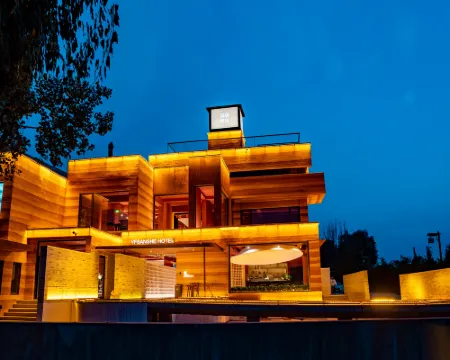 Yuanfang Shanshe Homestay Hotel (Rumeng Qikou) Các khách sạn ở Huyện Lâm