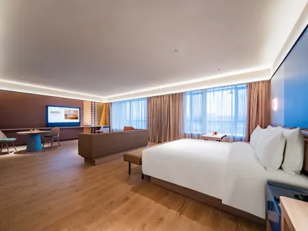 The Orange Hotel (Mianxian Mianshuiwan Square Store, Hanzhong) Отели рядом с достопримечательностью «Gaojiang Road»