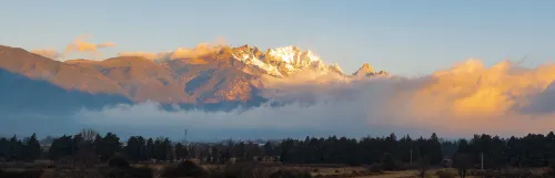 Thousands of Mountains Veiled in Evening Snow • Golden Rays Gilding the Peaks | Panoramic View Hotel