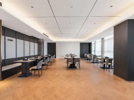 Mehood Hotel (Nantong Airport Wanyou Life Plaza Branch) Отели рядом с достопримечательностью «Zihui Park»