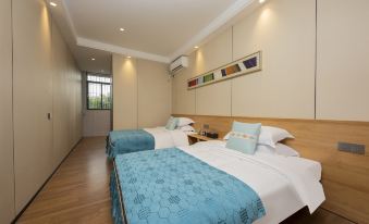 Aiqin Business Apartment (Shenzhen Longgang Liyuan Subway Station)