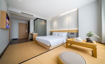Manzhou Hotel (Pingjiang Bus Station Outlet)