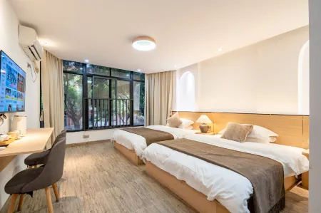 Lotus Rest Отели рядом с достопримечательностью «Jiuguanyi Gujie Alley»