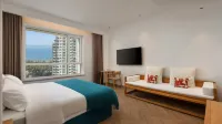 Floral · Lanhai Designer Hotel (Weihai International Bathing Beach Huoju 8th Street Branch) - balcony