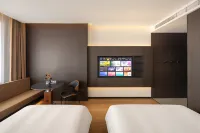 Jige Hotel (Tiexi Labor Park) - พร้อมอาหารเช้า