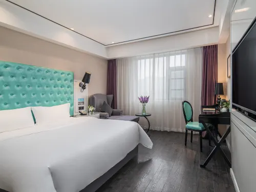 Xian Qinya Hotel (Peng'an Wuxing Garden)