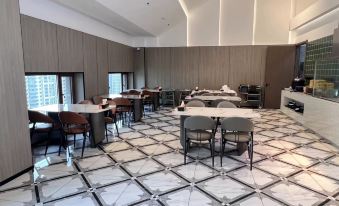 Xingcheng Hotel (Harbin Qunli Yintai City Shopping Center)