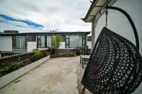 Chun Shu mu yun linhai boutique minsu (Dali caicun wharf branch)