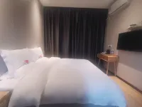Luoyang Jumei Hotel (Longmen High Speed Railway Station Guanlin Branch)