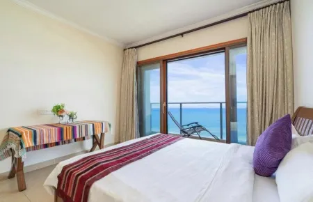 Wuchuan Le King Resort Apartment Отели в г. Учуань