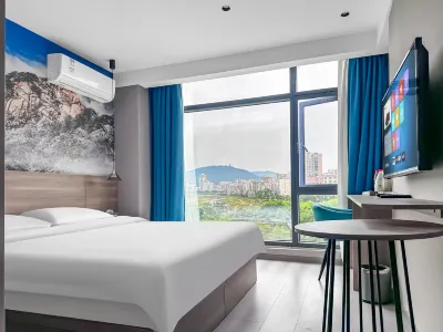 Happy Holiday Hotel (Huanggang Luotian Yishui Bund Branch)
