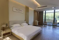 Golden Mountain & Bamboo  INN Hotéis em Lujiang