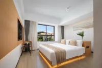 Daisy Inn Sanya فنادق في سانيا