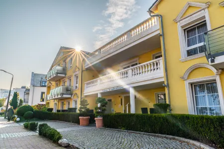 Arkona Strandresidenzen Отели в г. Бинц