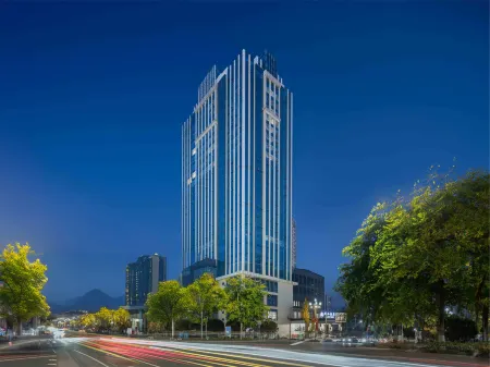 Minshan Hotel Mianyang Отели рядом с достопримечательностью «Yuewang Tower»